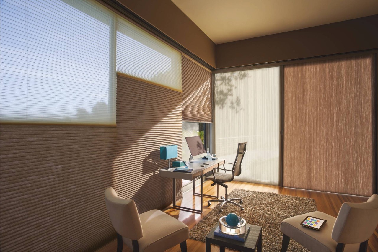 Home office outfitted with brown top-down/bottom-up Hunter Douglas Cellular Shades near Ann Arbor, MI