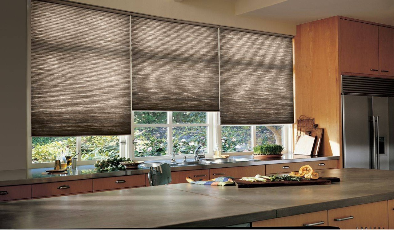 Gray Hunter Douglas Duette® Cellular Shades dressing warm kitchen windows near Ann Arbor, MI