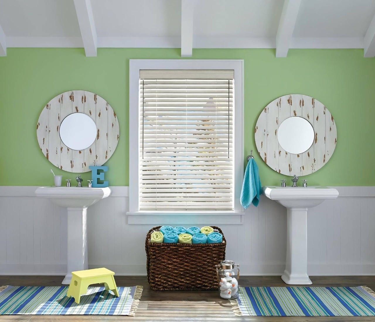 Hunter Douglas EverWood® Faux Wood Blinds decorating a bathroom window between twin sinks near Ann Arbor, MI